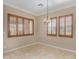 Charming dining area with natural lighting from shuttered windows and a decorative chandelier at 12852 W El Sueno Dr, Sun City West, AZ 85375