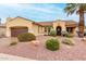 Beautiful single-story home with a well-maintained lawn, desert landscaping, and a two-car garage at 12852 W El Sueno Dr, Sun City West, AZ 85375