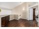 Hallway featuring wood floors, and an open design to the rest of the house at 12955 E Mercer Ln, Scottsdale, AZ 85259