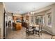 Eat in kitchen area featuring stainless steel appliances and natural wood cabinets at 12955 E Mercer Ln, Scottsdale, AZ 85259