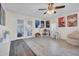 Bright living room features ceiling fan, and playful decor at 14446 N 40Th Pl, Phoenix, AZ 85032