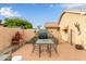 Enclosed back patio with outdoor dining and grill area perfect for entertaining at 1453 E Butler Cir, Chandler, AZ 85225