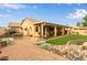 Outdoor area with tiled patio, grill, seating, lush lawn, and rock garden, great for entertaining at 1453 E Butler Cir, Chandler, AZ 85225