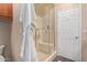 Modern bathroom featuring a glass-enclosed shower with a built-in bench and stylish tile work at 1453 E Butler Cir, Chandler, AZ 85225