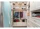 Well-organized walk-in closet with ample shelving, drawers, and hanging space for storage at 1453 E Butler Cir, Chandler, AZ 85225