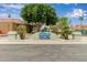 Entrance to 'The Springs' Swim and Racquet Club, marked by a sign and lush greenery, invites residents and guests at 1453 E Butler Cir, Chandler, AZ 85225