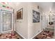 Inviting foyer with tile flooring, mirror, and art pieces at 1453 E Butler Cir, Chandler, AZ 85225