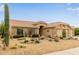 Attractive desert landscaping with cacti and gravel, enhancing the curb appeal of this beautiful home at 1453 E Butler Cir, Chandler, AZ 85225