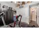 Home gym featuring a ceiling fan, treadmill and adjacent closet for organized storage at 1453 E Butler Cir, Chandler, AZ 85225