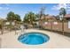 Community hot tub with tiled interior and landscaped surroundings for a resort-like relaxation experience at 1453 E Butler Cir, Chandler, AZ 85225