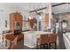 Modern kitchen with stainless steel appliances, island with breakfast bar, and pendant lighting at 1453 E Butler Cir, Chandler, AZ 85225