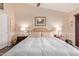 Comfortable main bedroom with ceiling fan, neutral tones, and ample natural light at 1453 E Butler Cir, Chandler, AZ 85225