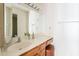 Well-lit bathroom featuring a vanity and a large mirror at 16402 N 31St St # 115, Phoenix, AZ 85032