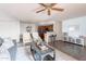 Open concept living room with a view of the kitchen and dining area at 16402 N 31St St # 115, Phoenix, AZ 85032