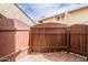 Enclosed patio with tiled flooring, and a low privacy fence at 16402 N 31St St # 115, Phoenix, AZ 85032