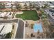 Aerial community view featuring a central park with playground, basketball court, and grassy area at 16634 N 33Rd Way, Phoenix, AZ 85032