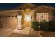 Inviting single-Gathering home featuring desert landscaping, a two-car garage, and covered front entry at 16634 N 33Rd Way, Phoenix, AZ 85032