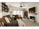 Inviting living room with a fireplace and comfortable sectional sofa at 16634 N 33Rd Way, Phoenix, AZ 85032