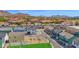 Aerial view of colorful neighborhood homes with landscaped yards and mountain backdrop at 16875 N 12Th St # 24, Phoenix, AZ 85022