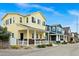 A row of colorful homes showcasing the charming architecture of this community at 16875 N 12Th St # 24, Phoenix, AZ 85022