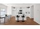 Modern kitchen featuring a large island with bar seating and an open dining area at 16875 N 12Th St # 24, Phoenix, AZ 85022