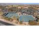 Active pickleball courts and lush landscaping offer a vibrant community atmosphere and recreational opportunity at 16945 W Vernon Ave, Goodyear, AZ 85395