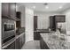 Well-equipped kitchen featuring stainless steel appliances and ample cabinet space at 18007 N 66Th Way, Phoenix, AZ 85054