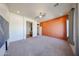 Large bedroom with neutral carpet, ceiling fan and natural light at 18178 W Desert View Ln, Goodyear, AZ 85338