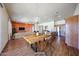 Spacious dining area adjacent to the kitchen and living room, perfect for entertaining and Gathering meals at 18178 W Desert View Ln, Goodyear, AZ 85338