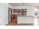 Spacious kitchen with center island, stainless appliances, and wood cabinetry at 18178 W Desert View Ln, Goodyear, AZ 85338