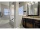 Bright bathroom with a soaking tub, double sinks, and modern fixtures and finishes at 18436 E Celtic Manor Dr, Queen Creek, AZ 85142