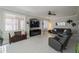 Cozy living room features a modern fireplace, comfortable seating, and stylish decor at 18436 E Celtic Manor Dr, Queen Creek, AZ 85142