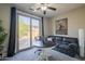 Bright sitting area with outside access and a view of the home's private outdoor space at 18436 E Celtic Manor Dr, Queen Creek, AZ 85142