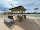 Community gazebo and sitting area, perfect for relaxing and socializing near the basketball court at 18502 N Celis St, Maricopa, AZ 85138