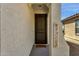 Welcoming entryway with a secure front door and a 'Welcome Home' mat, adding a personal touch at 18502 N Celis St, Maricopa, AZ 85138