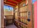 Up-close detail of an outdoor tiki bar, showing interior bar with decorations at 18502 N Celis St, Maricopa, AZ 85138