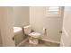 Powder room featuring a pedestal sink and modern fixtures at 18925 W Windsor Blvd, Litchfield Park, AZ 85340