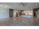 Bright and airy kitchen featuring a large island, stainless steel appliances, and ample cabinet space at 18925 W Windsor Blvd, Litchfield Park, AZ 85340