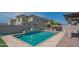 Backyard pool with outdoor kitchen, pergola, tiled patio and perimeter wall at 18925 W Windsor Blvd, Litchfield Park, AZ 85340