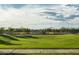 Basketball court with green space, lights, umbrellas, and seating at 1909 W Lariat Ln, Phoenix, AZ 85085