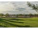 Basketball court with green space, lights, umbrellas, and seating at 1909 W Lariat Ln, Phoenix, AZ 85085