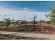 Community basketball court with desert landscape, mountains, shade structures, and picnic tables at 1909 W Lariat Ln, Phoenix, AZ 85085