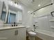 Clean bathroom featuring modern black fixtures, vanity, and shower with updated finishes at 1909 W Lariat Ln, Phoenix, AZ 85085