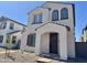 Charming two-story home with a well-manicured yard, inviting entrance and an arched entryway at 1909 W Lariat Ln, Phoenix, AZ 85085