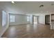 Bright, open living space with tile flooring, big windows, and sliding glass doors to the back at 1909 W Lariat Ln, Phoenix, AZ 85085