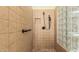 Walk in shower with hand held shower head and glass block window at 1926 W Wayne Ln, Anthem, AZ 85086