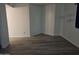 Spacious bedroom with plank flooring and natural light, ready for personalization at 2220 W Dora St # 114, Mesa, AZ 85201