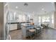 Bright kitchen featuring an island, a breakfast bar, stainless steel appliances, and ample counter space at 22338 N O Sullivan Dr, Maricopa, AZ 85138