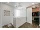 Modern shower showcasing floor-to-ceiling tile, glass partition, and unique stone accent wall at 22338 N O Sullivan Dr, Maricopa, AZ 85138