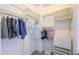 Walk-in closet features wire shelving, rods, and a drawer unit at 22338 N O Sullivan Dr, Maricopa, AZ 85138